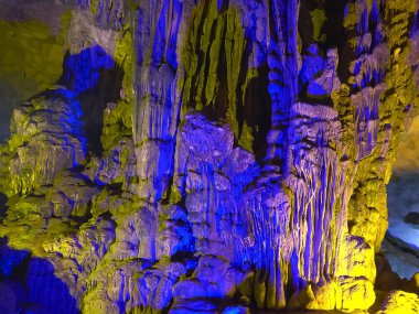 shot of stalactites in sung sot cave at halong bay clipart
