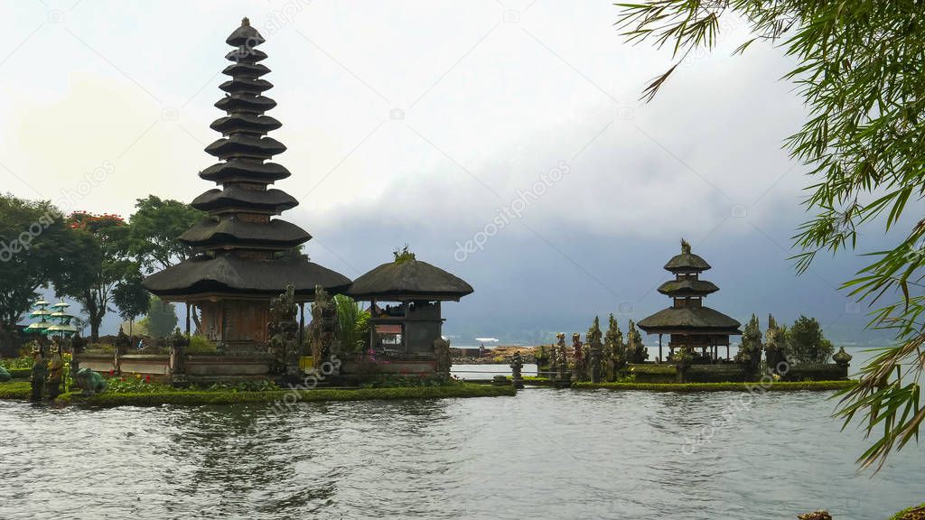 ulun danu beratan temple framed by bamboo on bali