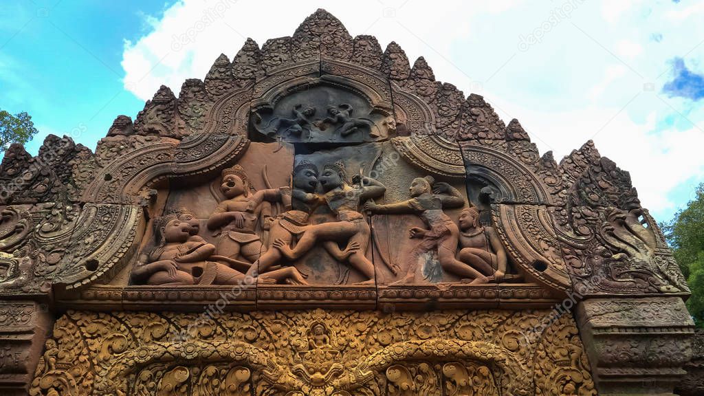 fight scene on west pediment of banteay srei temple angkor