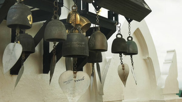 close up of small bells at wat saket temple in bangkok