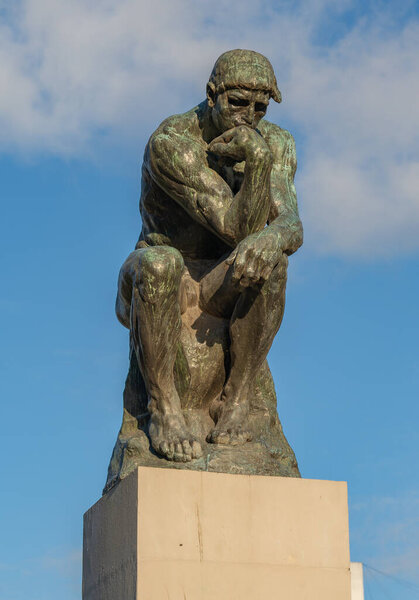 BUENOS AIRES, ARGENTINA- MARCH, 10, 2024: a front view of the thinker sculpture by auguste rodin on a sunny morning