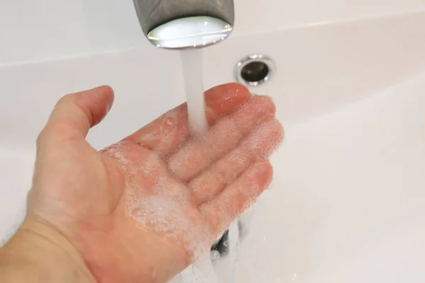 Man Checks Water Temperature Bathroom — Stock Photo, Image