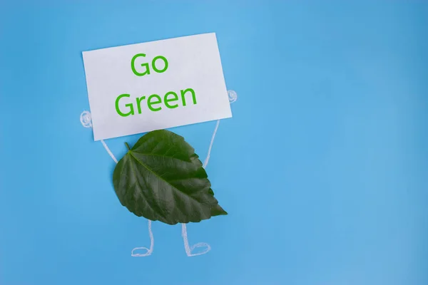 Green Leaf Character Holding Poster Environmental Concept — Stock Photo, Image