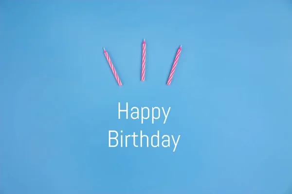 creative happy birthday concept on blue background