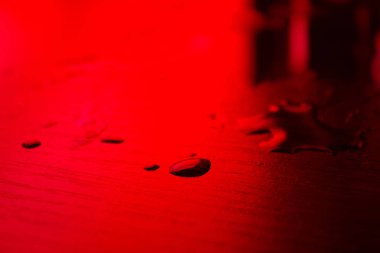 bloodstain on dark background. murder concept image