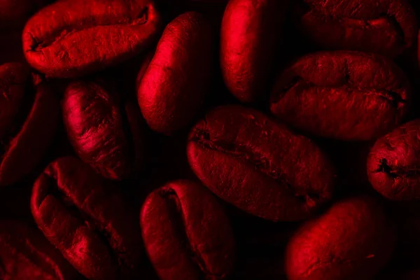 Roasted coffee bean close up in neon light