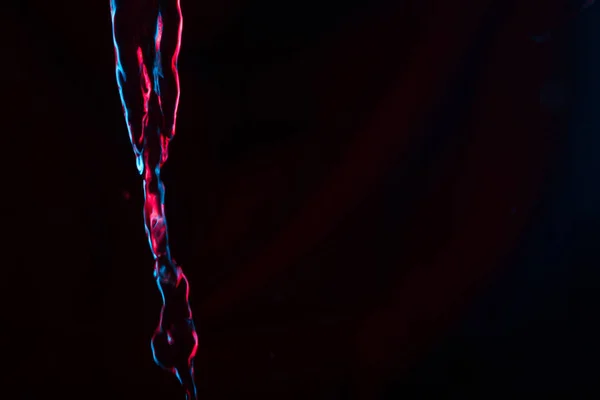 Red Blue Neon Background Water Flow Defocused — Stock Photo, Image