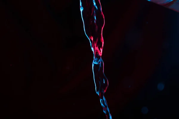 Roter Und Blauer Neon Hintergrund Aus Dem Wasserfluss Defokussiert — Stockfoto