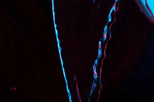 Red Blue Neon Background Water Flow Defocused — Stock Photo, Image