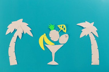 Yaz konsepti görüntü. ananas mavi zemin üzerine. Kağıt kesiği