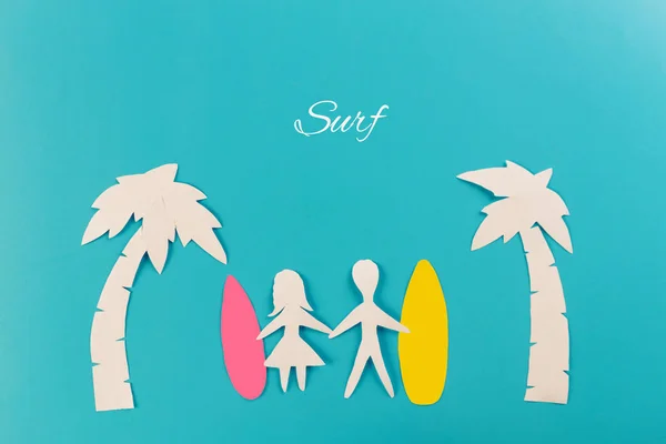 surf concept image, surfboards and palm trees. paper cut