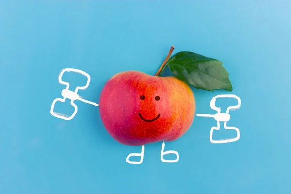 funny apple character with dumbbells. fitness concept