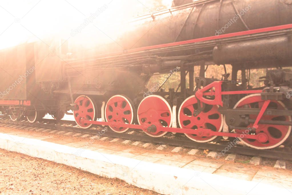 old retro train on a railroad. toned image