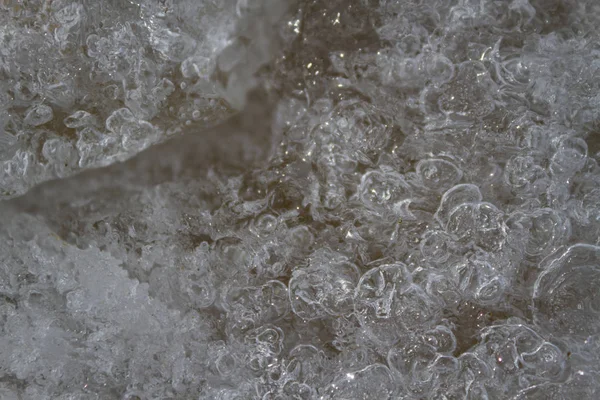 Fundo de gelo com marcas de patinação e hóquei. Pista de hóquei no gelo arranha a superfície — Fotografia de Stock