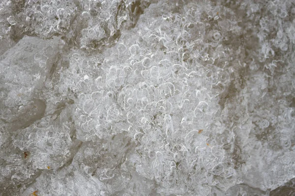 Fundo de gelo com marcas de patinação e hóquei. Pista de hóquei no gelo arranha a superfície — Fotografia de Stock