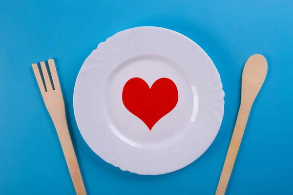 Amor culinario. corazón en un plato —  Fotos de Stock