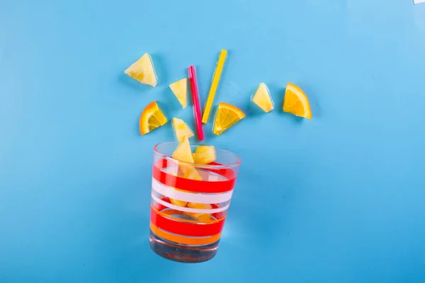 Tropical fruits on the blue background — Stock Photo, Image