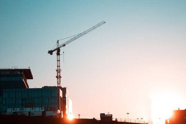 Building construction site with construction cranes