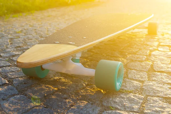 black longboard on the street