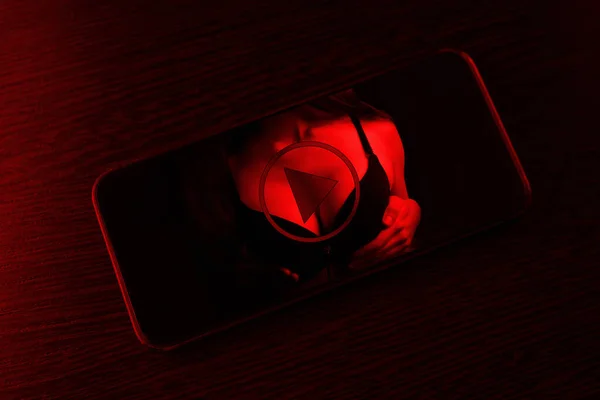 Cell phone on dark background — Stock Photo, Image