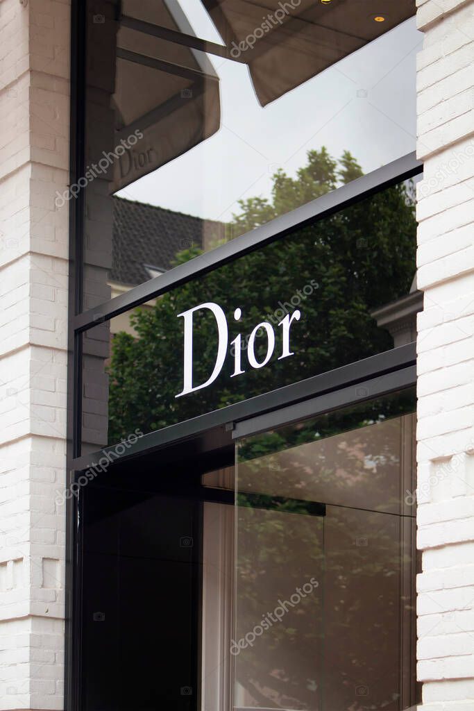 View of signage of French fashion goods manufacturer's store on luxury shopping street named 