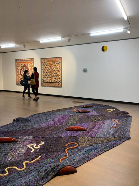 View of women visiting 16th Istanbul Biennial titled "Exploring the Seventh Continent" at Istanbul Museum of Painting and Sculpture.