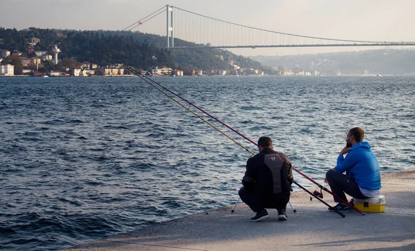 Two Fishermen Bosphorus Istanbul Fsm Bridge Background — Stock Photo, Image