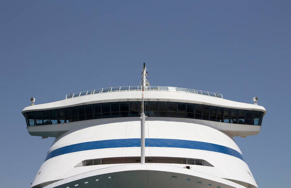 Close up view of big cruise ship moored at Ibiza port.