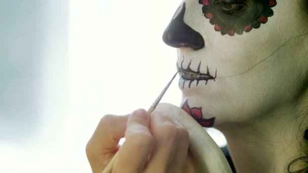 Halloween Party Make Up Artist Is Making Woman Up As Skull For Celebration Of The Mexican Day Of The Dead 4k Video By C Actionstore Stock Footage 215370056