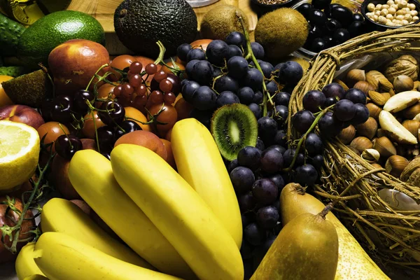 Φρέσκα Φρούτα Ξηροί Καρποί Πολύχρωμο Φόντο Ανάμεικτων Φρούτων Υγεία Διατροφή — Φωτογραφία Αρχείου