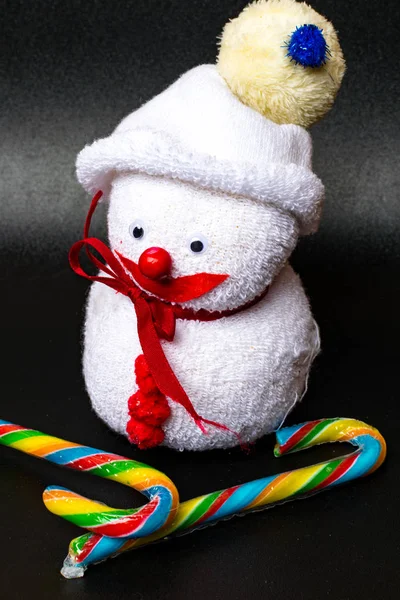 Weihnachten Hintergrund Zuckerstangen Schneemannspielzeug Weihnachts Oder Neujahrsgrußkarte — Stockfoto