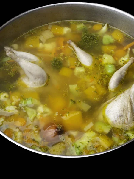 Soup with quail stands on table in pan close up — Stock Image Soup Quail Stands Table Pan Close Stock Image