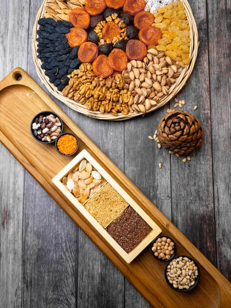 Healthy food. Selection of good carbohydrate sources, high fiber rich food. Low glycemic index diet. cereals, legumes, nuts, dried fruits. Wooden background copy space Legumes bean seed nuts, Food sources of fiber, Concept image for healthy or vegeta