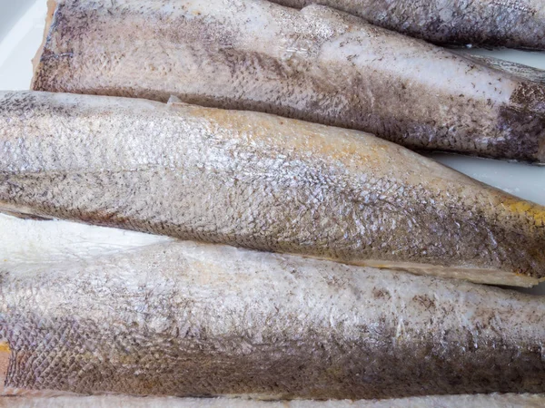 Fryst kummel fisk som mat bakgrund — Stockfoto