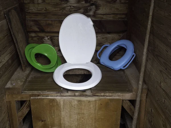 Garden toilet in rustic style is made of wooden boards. — Stock Image Garden toilet in rustic style is made of wooden boards. Stock Picture