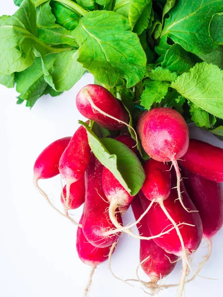 Fresh bunch of radish on white table — Stock Photo, Image