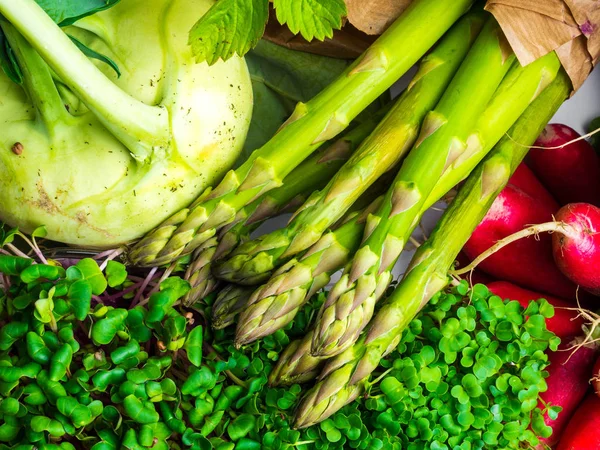 Composition with assorted raw organic vegetables and microgreens, close up — Stock Photo, Image