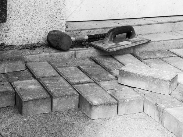Matériaux de chaussée, marteau, pagaie — Photo