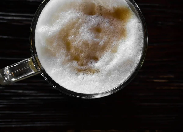 Coffee latte on black wood table near window, Coffee break — Stock Photo, Image