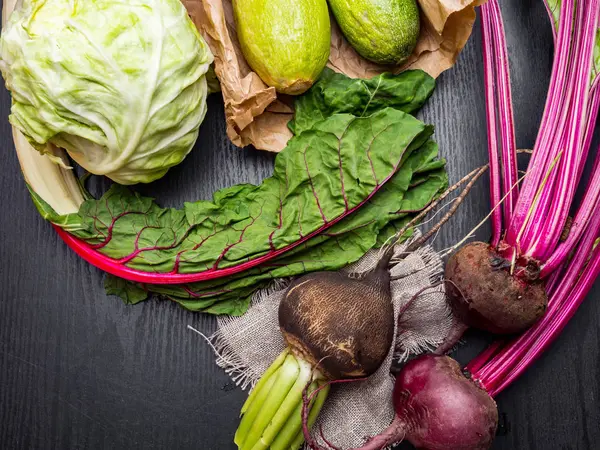 Vegetarian, vegan food cooking seasonal vegetables Flat-lay on wooden background, top view — Stock Photo, Image