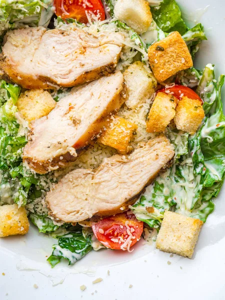 Healthy Grilled Chicken Caesar Salad with Cheese Croutons lettuce tomatoes