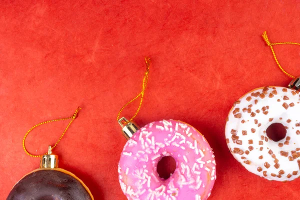 Christmas Colorful Donuts Red Background Winter Holidays Concept Copy Space — Stock Photo, Image