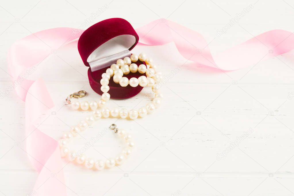 Opend red gift box with necklace for present with copy space
