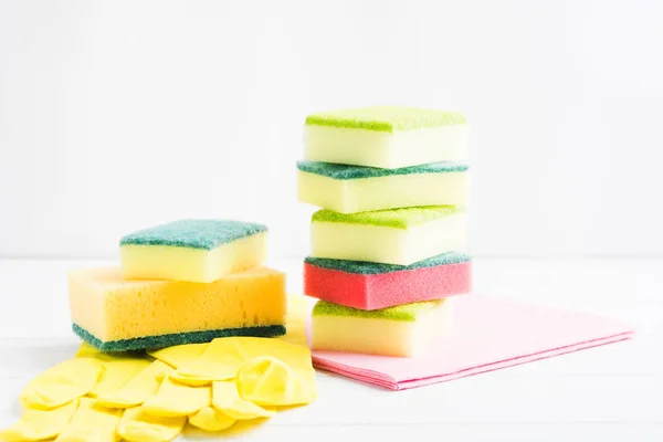 Stack of cleaning sponges and accessories for cleaning