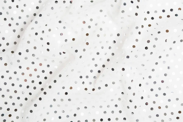 Послуга гламурного металевого блискітки. Білий тканинний текстильний матеріал з фоном срібних блискіток — стокове фото