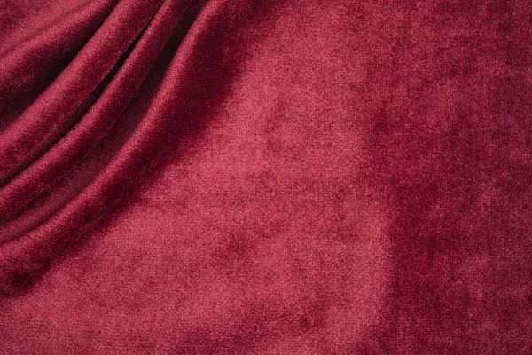Onde tessili su sfondo velluto rosso con spazio copia — Foto Stock