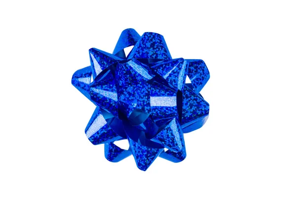 Blue paper holiday bow over white isolated background. Single object. Mockup. Top view — Stock Photo, Image