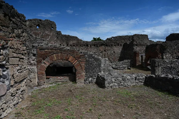 Red brick architectural arch in the ruins of the city