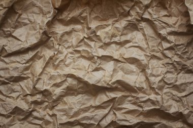 Vinyet gölge ile zanaat kahverengi buruşturulmuş kağıt arka plan dokusu.