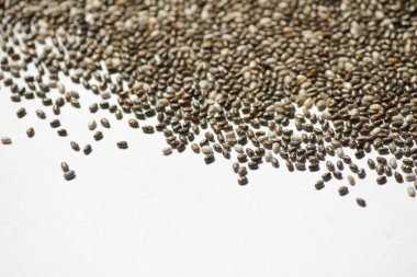 Chia tohumları beyaz arka plan üzerinde desen doku.